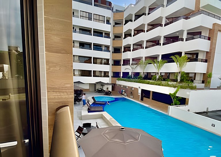 Flat com vista da piscina com café incluso