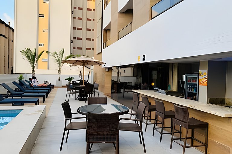 Flat com vista da piscina com café incluso