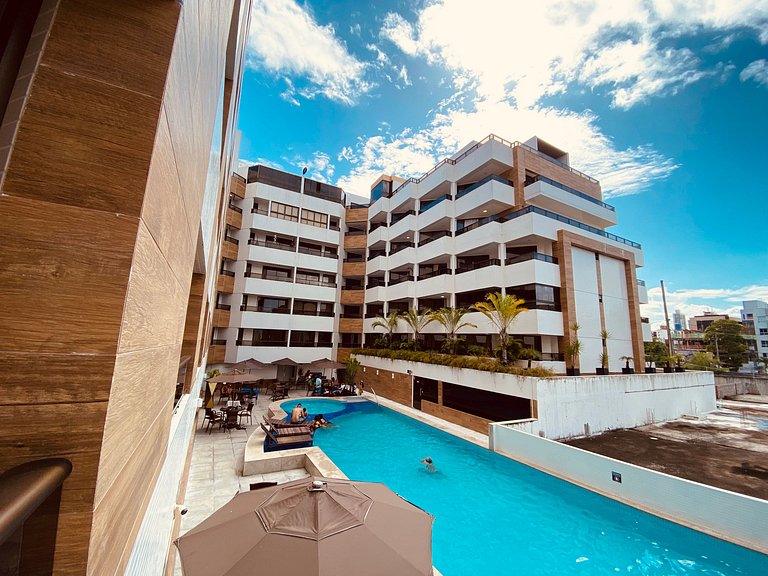 Flat com vista da piscina com café incluso