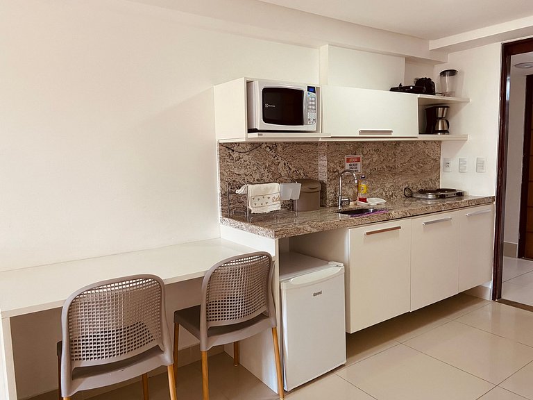 Flat com vista da piscina com café incluso