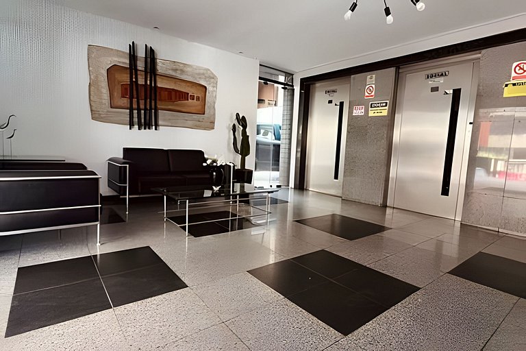 Flat Confortavel a poucos passos da praia