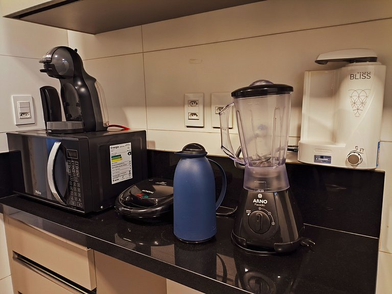 Apto aconchegante de 2 quartos com café incluso