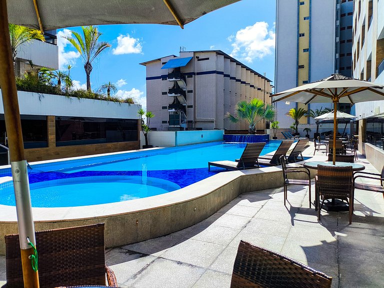 Apt amplo em luxuoso Hotel a 50 metros da praia