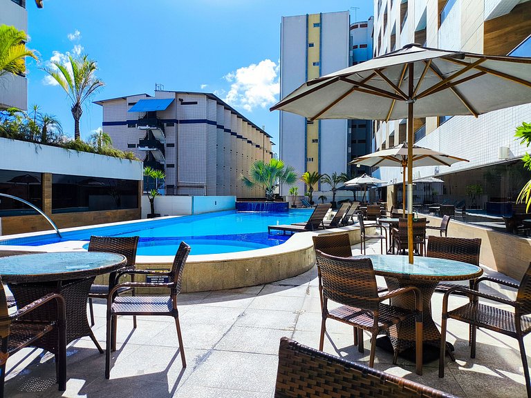 Apt amplo em luxuoso Hotel a 50 metros da praia