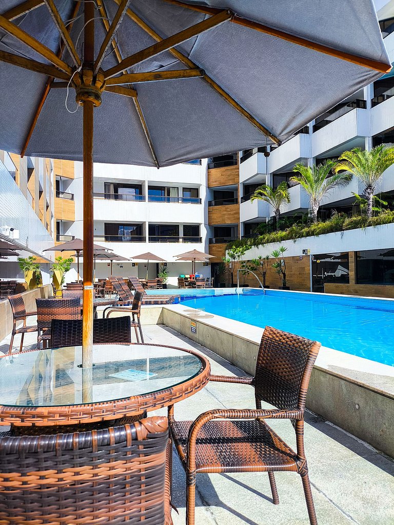 Flat com vista da piscina e perto do Mar