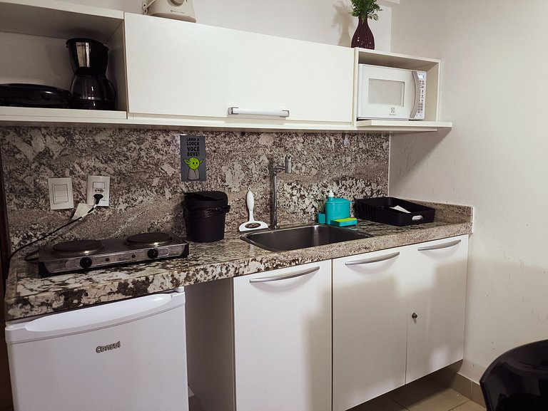 Apt amplo em luxuoso Hotel a 50 metros da praia