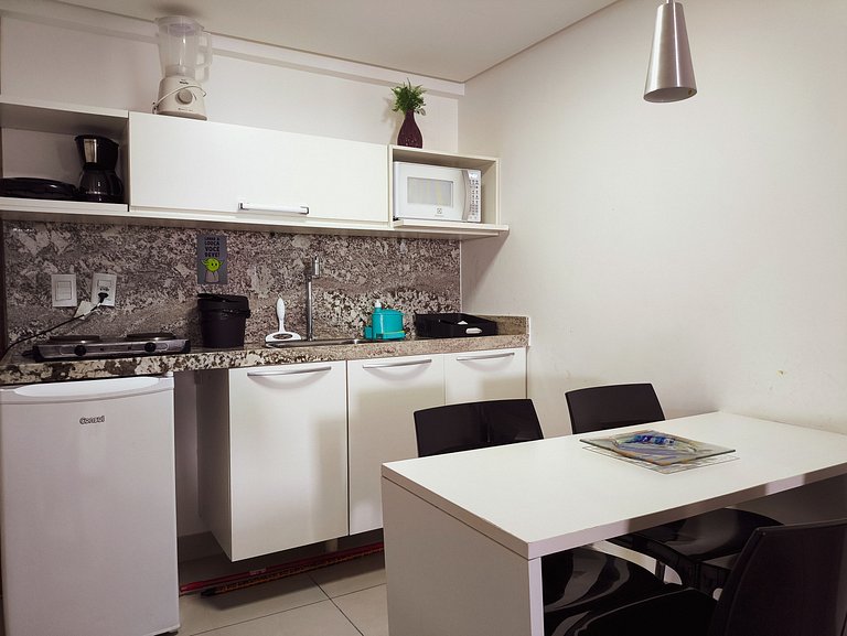 Apt amplo em luxuoso Hotel a 50 metros da praia