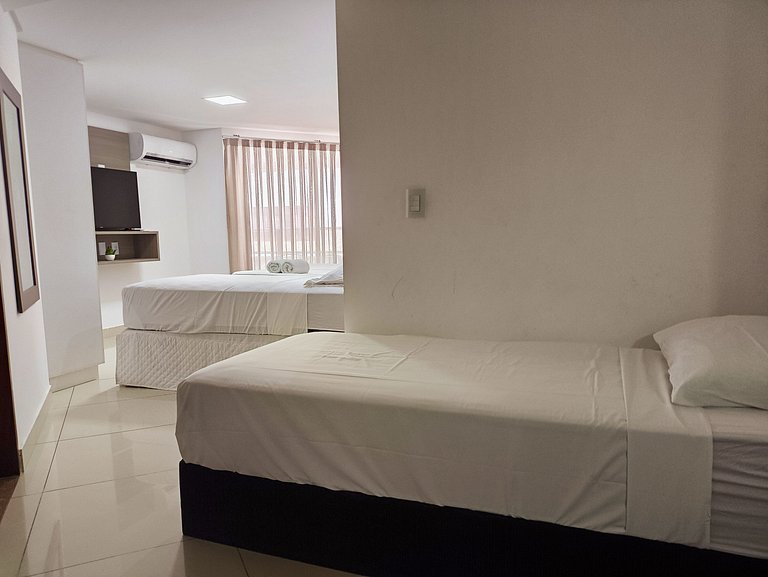 Apt amplo em luxuoso Hotel a 50 metros da praia
