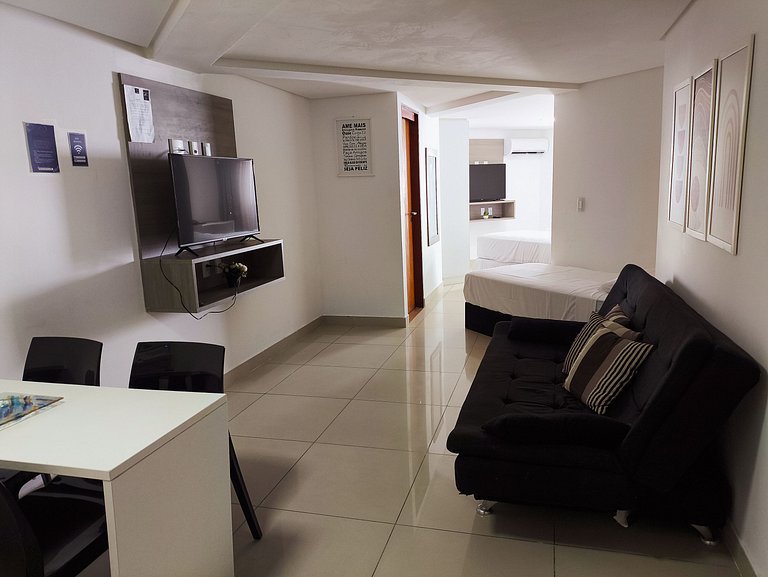Apt amplo em luxuoso Hotel a 50 metros da praia
